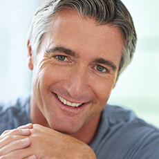 man smiling with dental implants in Bella Vista