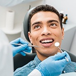 A dental checkup, which improves dental implant care in Bella Vista. 