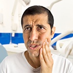 man dental pain office visit
